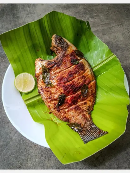 The complete Tawa Grilled Karimeen, simply prepared to let the natural taste of this exotic fish come through.