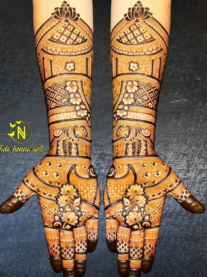 A beautiful Indian bridal design with architectural elements. The domes and patterns give it a royal feel, perfect for a bride on her special day.