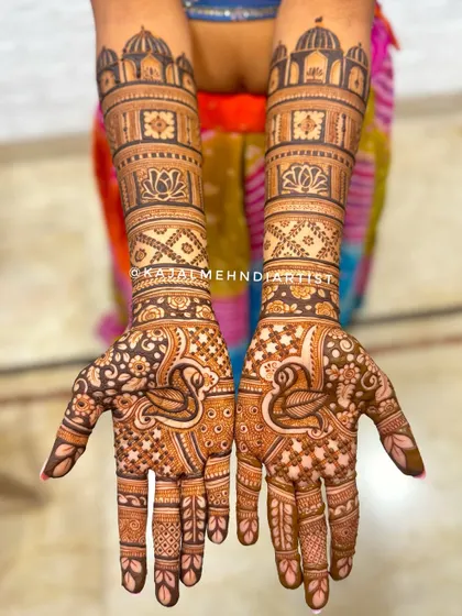 A beautiful full-hand design for a bridesmaid. The elegant swan motifs and architectural dome patterns create a look that is both traditional and stylish.