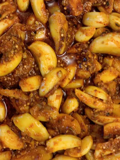 Our garlic pickle is too tasty and too real to miss. It's made with whole garlic cloves and a mix of traditional Indian spices.