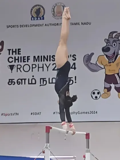 Oceana demonstrating flawless form and strength on the uneven bars during the Tamil Nadu State Level Artistic Gymnastics Championship.
