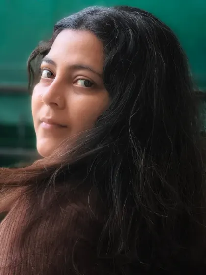 The wind in my hair, a simple moment of being present. This self-portrait is about capturing a feeling, not just a pose.
