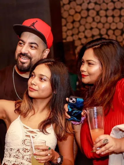 Posing with friends and fans at LOFT38. The Christmas party brought everyone together.