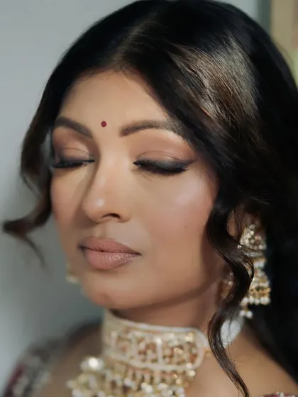 A close-up showing the soft, matte finish of the eye makeup. It's a look that defines the eyes without being heavy.