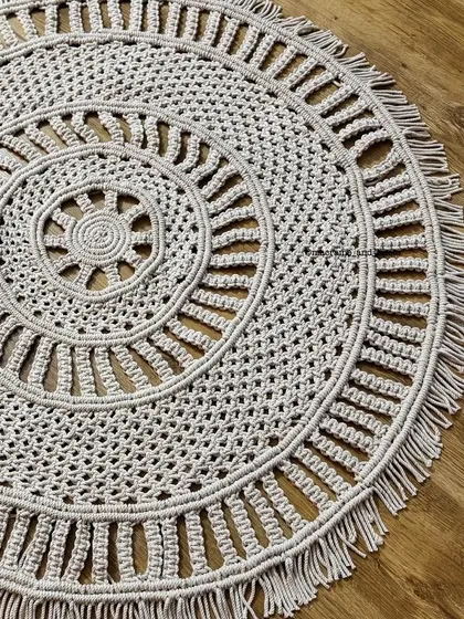 Another angle of the 50-inch rug, highlighting the texture and the fringed edge.