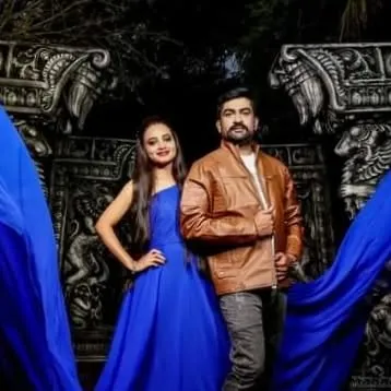 A cool and modern couple's look. I styled the groom in a trendy brown leather jacket and jeans to complement her simple yet elegant blue gown.