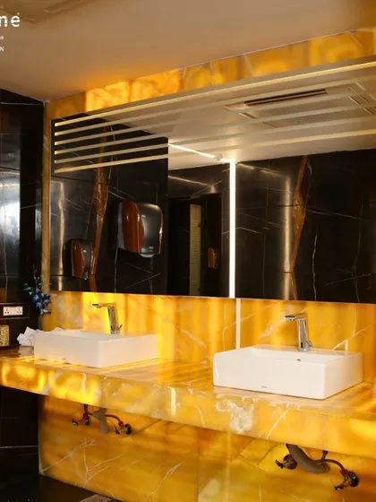 Another view of our pristine washroom and vanity area, showcasing the high-end finishes and attention to detail that define our club.