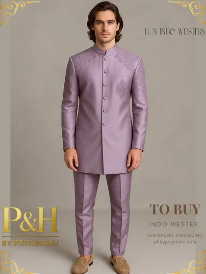 A unique creation in a soft lilac hue, this Indo-Western suit is crafted from self-embroidered handloom silk. The subtle texture of the fabric itself provides a quiet yet profound sense of luxury.