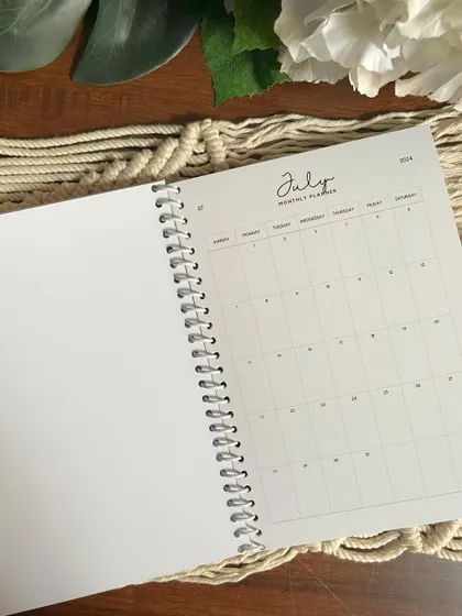 The July monthly planner page, with a clean grid layout for all your important dates and appointments.