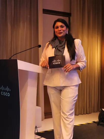 Posing with the Cisco branding after a successful event. I take pride in partnering with top-tier companies to create impactful corporate experiences.