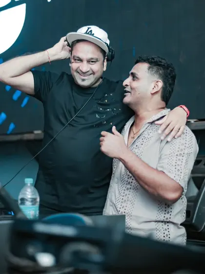 It's all about having fun and sharing that energy with the crowd. A moment of connection with my Tribal Brother during a packed set, making sure the vibe stays high all night.
