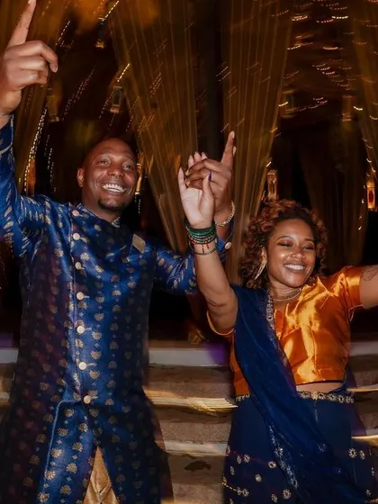 A lively entrance with friends and sparklers. We capture the collective joy and celebration of your Sangeet night, creating images that are full of energy and happiness.