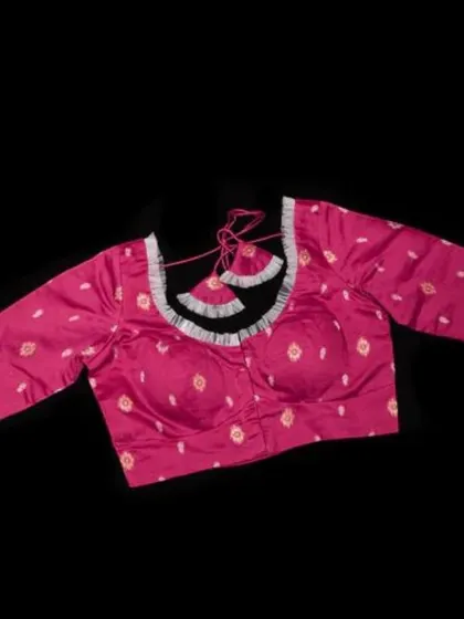 A full view of our pink Jamdani cotton blouse on a mannequin.