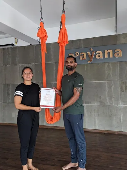 A moment of achievement as a student receives his certificate from our lead instructor.