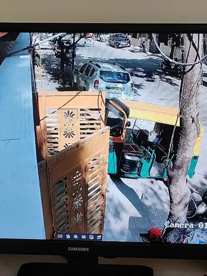 A clear daytime shot of the street, captured by a 4MP Hikvision IP camera with audio.