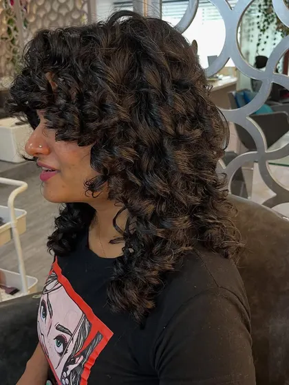 A side view showing the layers and texture of the curly shag.