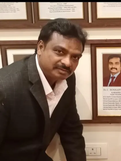 Here I am next to my plaque in the Karnataka Olympic Association's Hall of Fame. Being recognized in my home state is a special honor and a reminder of the journey from my local village to the national stage.