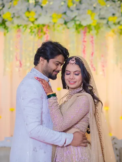 Reception glam on point. This couple looks elegant and stylish, ready for their grand celebration.