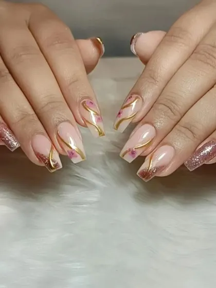 A duplicate image showing the full set of the nude, rose gold, and floral nail art.