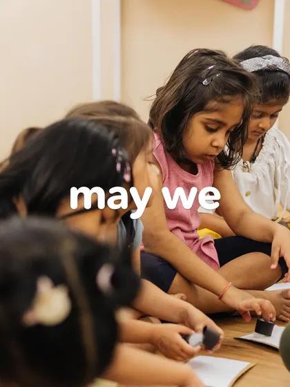 Girls sitting and learning together.