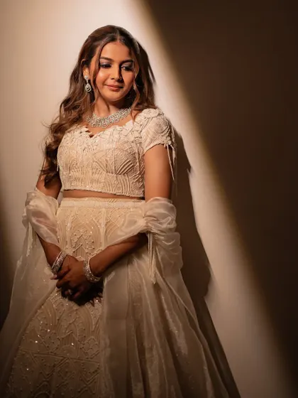 The dramatic lighting in this shot really shows off the beautiful contour and highlight on Shikha's face. A truly stunning sangeet bride.