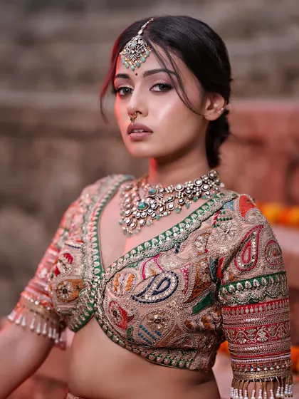 The makeup is designed to look beautiful in warm, dramatic lighting. This is a key skill for any aspiring makeup artist.