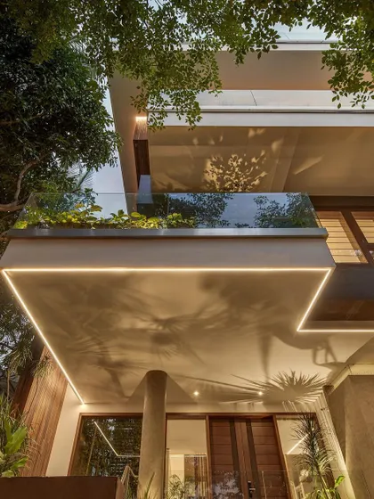 At dusk, the architectural lighting of Kanasu highlights its clean lines and creates beautiful shadow play on the cantilevered forms.
