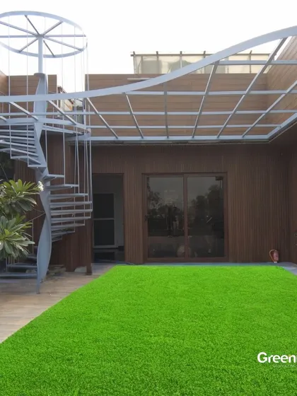 A stunning before and after of a terrace makeover. I installed a modern open pergola, WPC wall paneling, and vibrant green artificial grass to completely redefine the space, also adding a sleek spiral staircase for access.