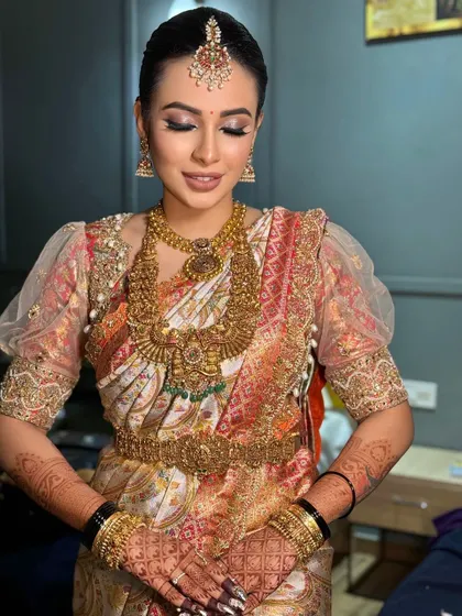 A serene, eyes-closed portrait showcasing the soft, blended eyeshadow and the overall elegance of the bridal look.