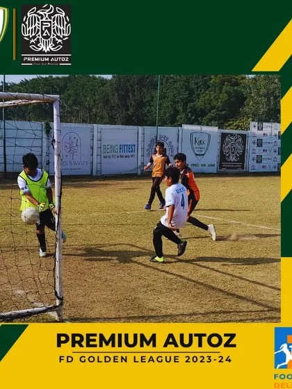 A goalkeeper makes a save during a tense moment in a Golden League game.