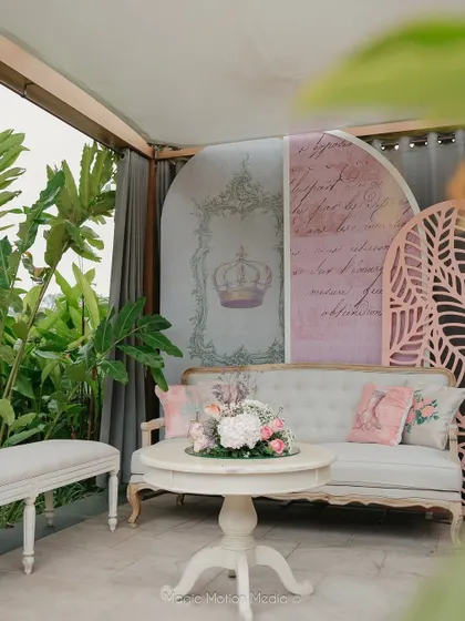 Another stylish lounge nook with custom backdrops and elegant furniture.
