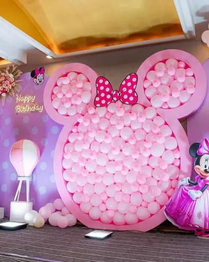 A close-up of the Minnie Mouse balloon mosaic. This intricate design is made of hundreds of small balloons and creates a huge visual impact.