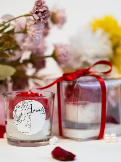 My 'Roseate Whispers' candle is designed to let love bloom. This shot glass candle features a stunning red rose design, elegantly packaged and ready to gift to your Valentine.