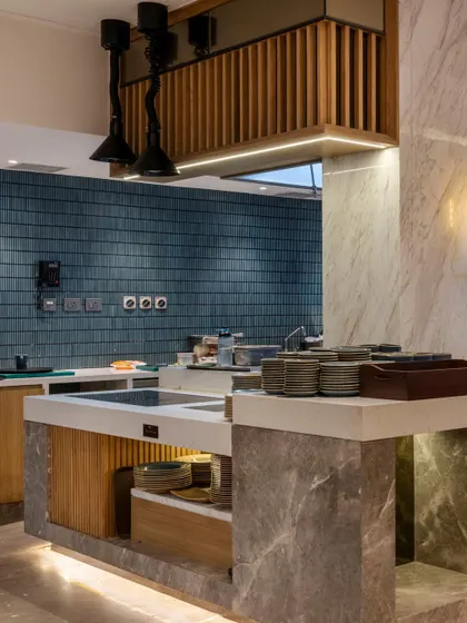 Additional views of the Radisson Resort, Khopoli, showcasing various interior and exterior details, from lobby seating areas and restaurant layouts to guest room configurations and architectural elements.
