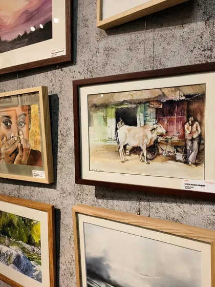 My painting hanging on the gallery wall in Vietnam, alongside other incredible artworks from around the world.