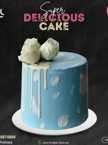 An elegant and artistic blue cake. This design features abstract white brushstrokes and a white chocolate drip, topped with beautiful white roses for a sophisticated finish.