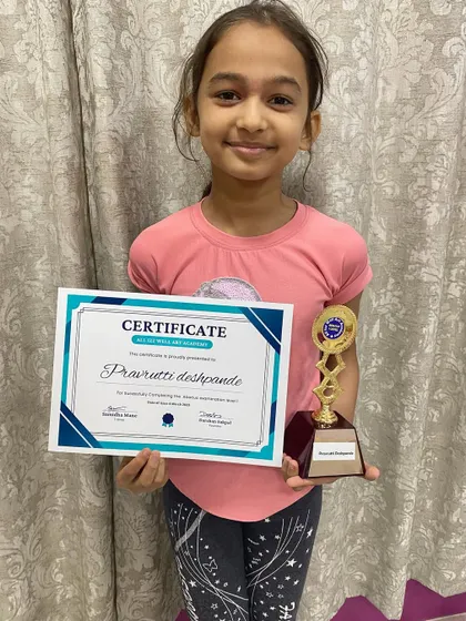 Pravrutti Deshpande from our Charni Road branch, happy after receiving her abacus prize.