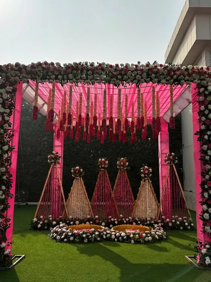 We believe every ceremony should reflect your personality. For this Haldi, we moved away from traditional yellow and created a dreamy setup using shades of pink, complete with a stunning floral mandap and hanging tuberoses.
