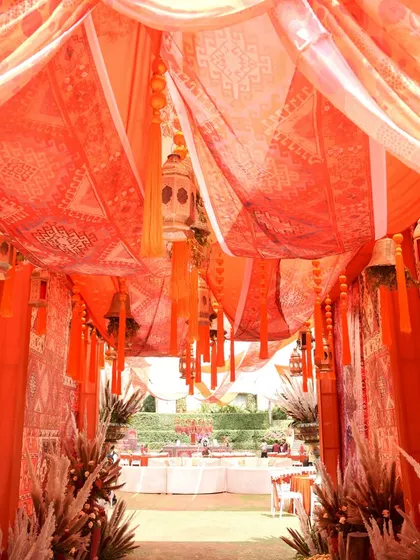 Looking up at the layered drapes and hanging lanterns of the Souk Bazaar entrance. The rich textures and warm lighting created a truly immersive experience.