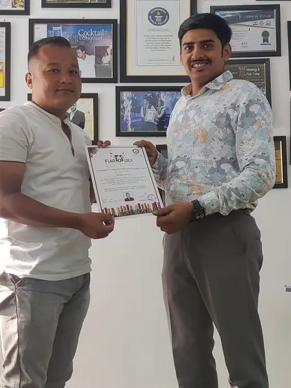 Founder Sachin Gowda presents a certificate to a proud graduate. We celebrate the hard work and dedication of every student who completes our professional bartending course.