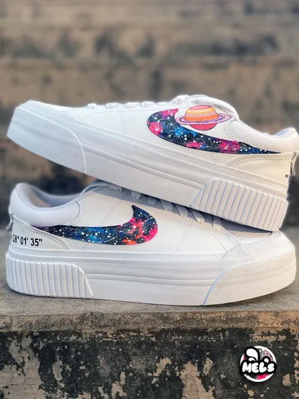 A variation of our cosmic design, this pair includes a hand-painted planet Saturn over the galaxy swoosh for an extra celestial touch.