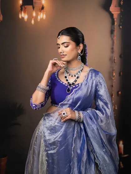 The overall look is one of minimalist fashion and radiance, perfect for a modern bride who wants to make a statement.