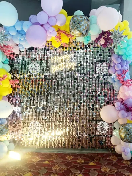 Another view of the sparkling sequin and balloon photo wall, perfect for a bright and cheerful celebration.