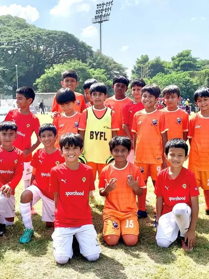 The U9 team with their opponents, showing great sportsmanship after their matches.