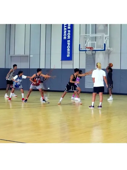 Coach Katie Batlin running our players through a defensive drill during a special two-day clinic.