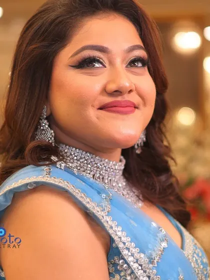A beautiful portrait of the bride on her engagement day. We focus on capturing the flawless makeup, stunning jewelry, and the happy glow of the bride-to-be.