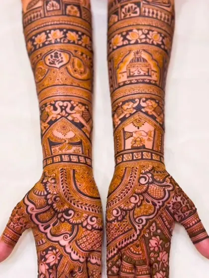 A very dense and intricate design covering the entire hands and forearms. This style is for the bride who loves a full, traditional mehndi look.
