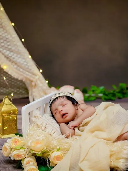Tiny hands, big dreams. This setup uses a miniature bed and a teepee to create a whimsical and adventurous feel.