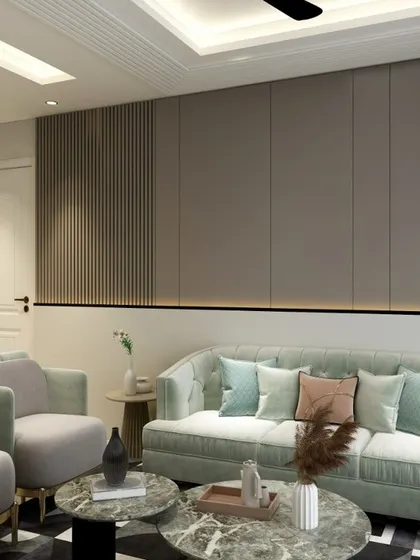 A living room that showcases a serene and sophisticated color palette. The light green sofa, marble coffee tables, and geometric rug come together to create a modern and elegant space.