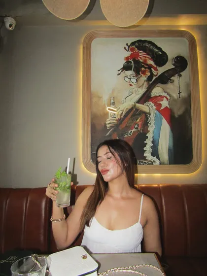 Sipping on a mojito. This outfit is all about effortless style for a casual brunch diary entry.